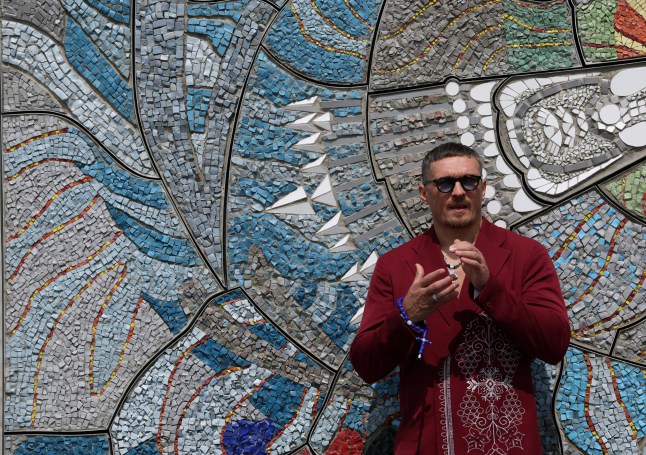 Boxing - Heavyweight Champion Oleksandr Usyk Launches a Fundraiser for the rebuilding of apartment buildings in Ukraine - Trafalgar Square, London, Britain - July 14, 2025 Oleksandr Usyk during the presentation of piece of art destroyed during the war between Ukraine and Russia, reconstructed by Ukrainian business ROZETKA, originally created by artist Alla Horska, as he is launching a fundraiser for the rebuilding of apartment buildings in Ukraine Action Images via Reuters/John Sibley TPX IMAGES OF THE DAY