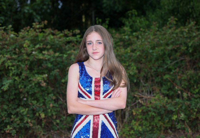Courtney Wright posing in her Union flag dress