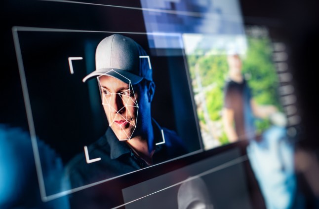 Face recognition and photo detection with artificial intelligence on a large screen.