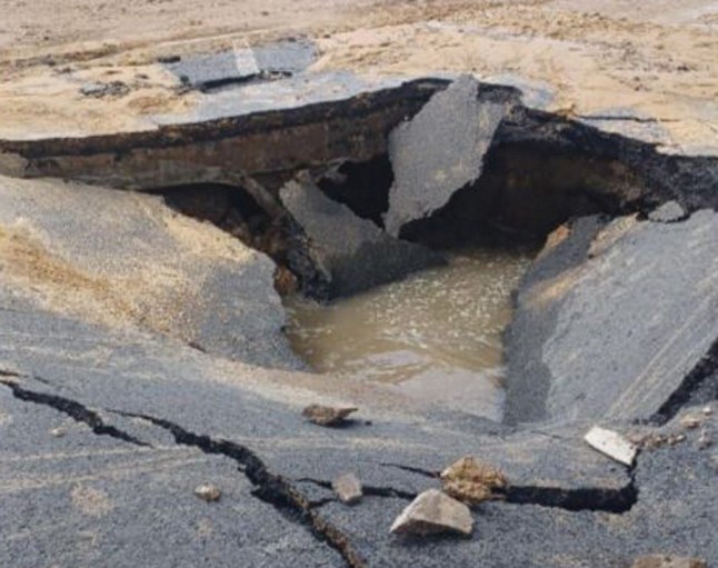 The burst water main.