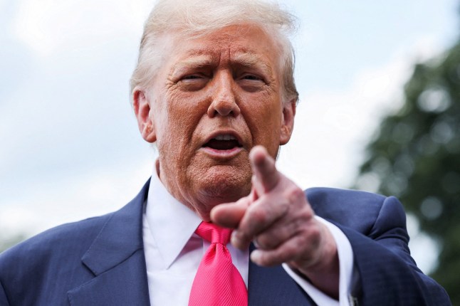 U.S. President Donald Trump speaks with reporters, as he departs for travel to Pennsylvania from the South Lawn at the White House in Washington, D.C. U.S., July 15, 2025. REUTERS/Jonathan Ernst