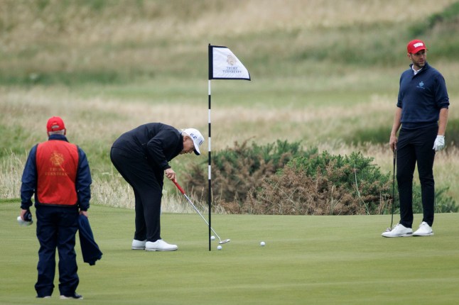 epa12265576 US President Donald J. Trump (C) and his son Eric Trump (R) play at Trump Turnberry golf course during a private visit in Turnberry, Scotland, Britain, 27 July 2025. US President Trump is in Scotland where he will visit his golf courses and meet with UK Prime Minister Keir Starmer. EPA/TOLGA AKMEN
