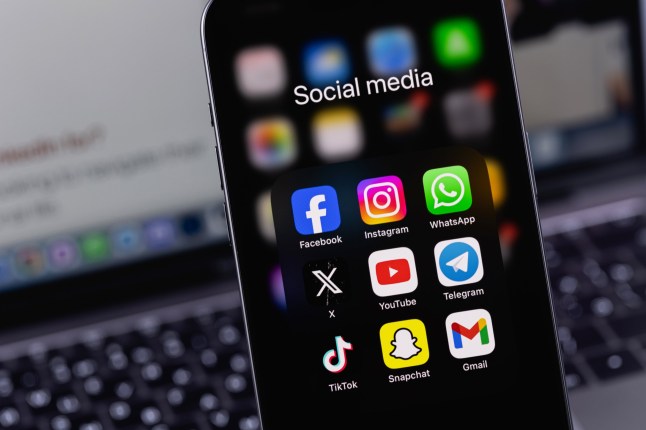 smartphone with mobile apps closeup, Facebook, Instagram, WhatsApp, Twitter X, YouTube, Telegram, TikTok, Snapchat. Popular social media platform for marketing. Batumi, Georgia - February 11, 2024; Shutterstock ID 2464186563; purchase_order: -; job: -; client: -; other: -
