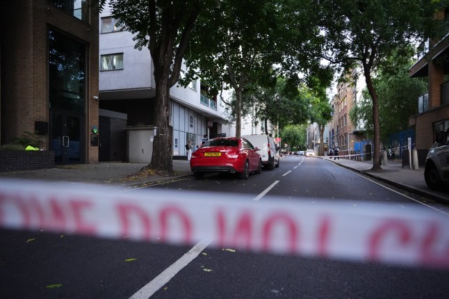 The scene in Long Lane, Southwark, taped off.