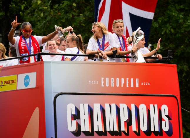 Supporters of the Euros-winning England women???s football team gather on the Mall for the open top bus parade.