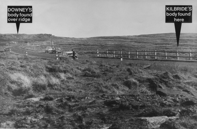 A view of Saddleworth Moor in the South Pennines, annotated to show the burial locations of two of the victims of Moors murderers Ian Brady and Myra Hindley, 10th December 1965. In October, the body of 10 year-old Lesley Ann Downey was found over the ridge on the left, and that of 12 year-old John Kilbride was discovered at the spot marked on the right. (Photo by Keystone/Hulton Archive/Getty Images)