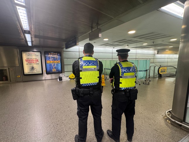 Police guard the scene in St Pancras