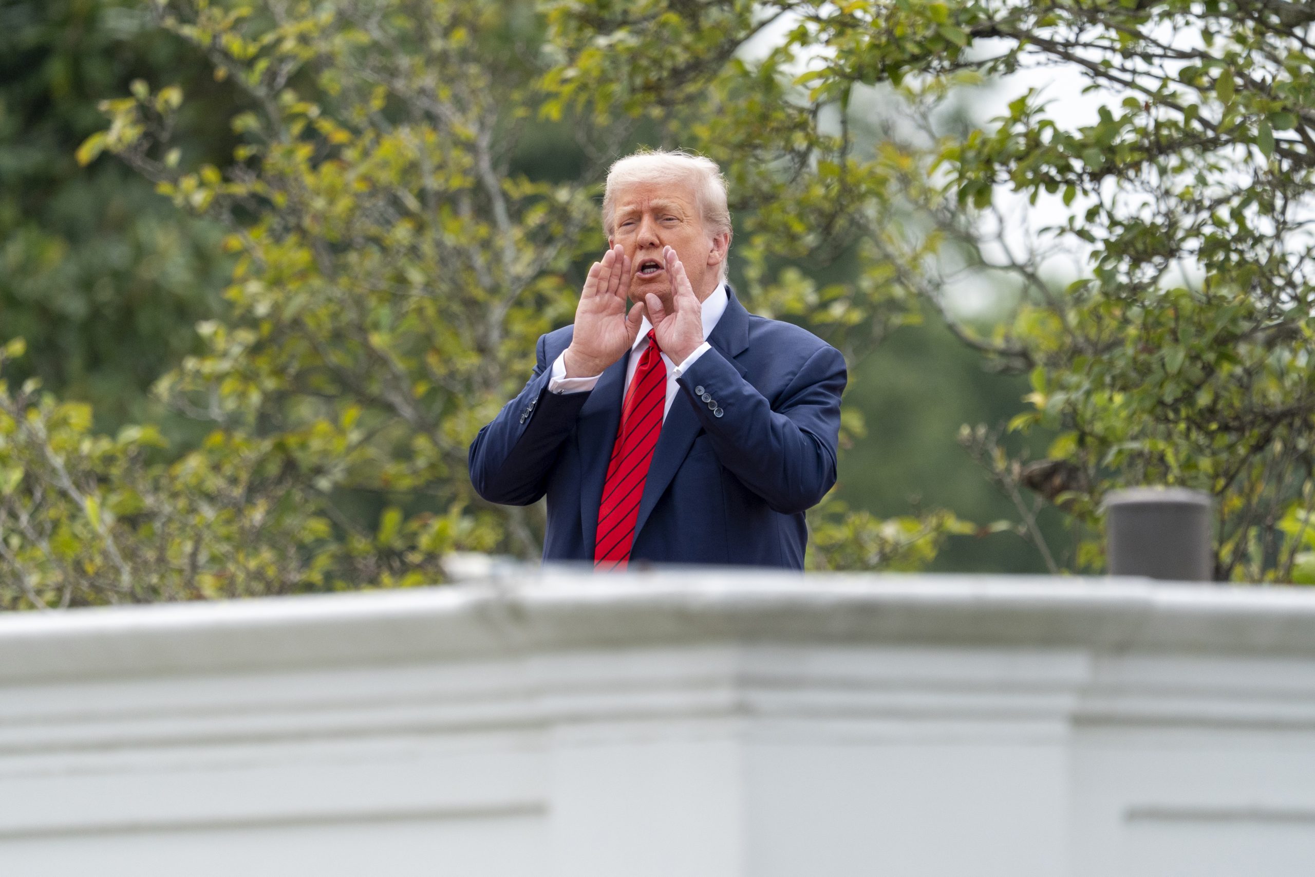 Trump takes an unexpected walk on the White House roof post thumbnail image