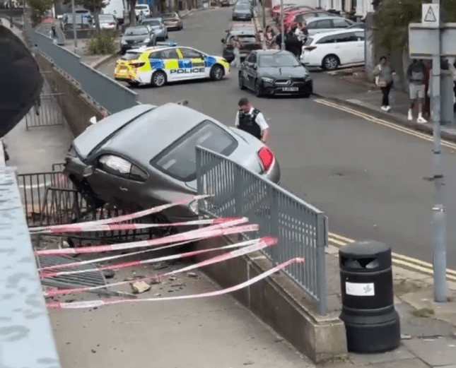 Moment man pulled out of Bentley after ploughing into tube station entrance post thumbnail image