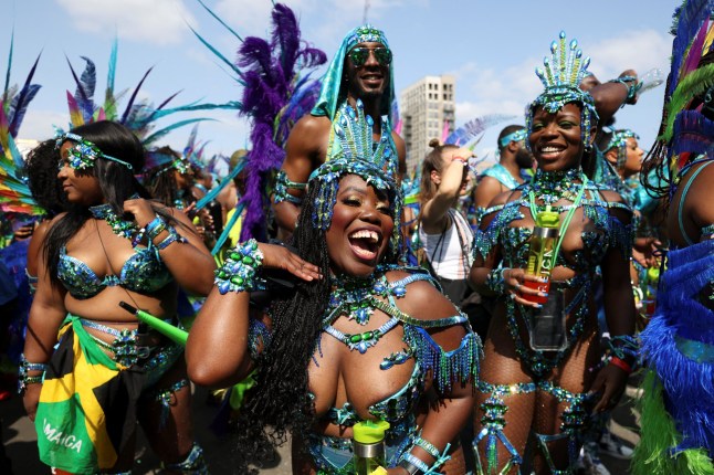 People participate in the Notting Hill Carnival parade, in London, Britain, on August 26, 2024. REUTERS/Hollie Adams