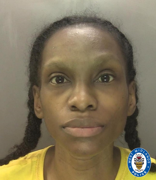 A police mugshot of Naiyahmi wearing a yellow shirt and pigtails.