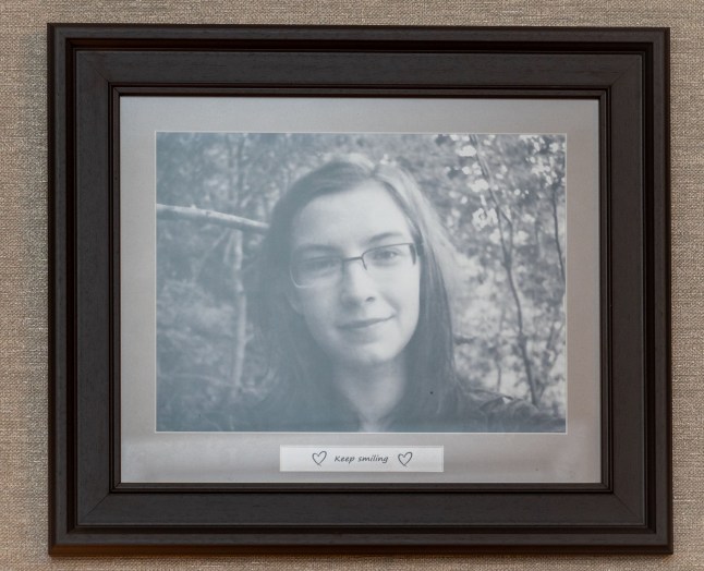 Pictures around the house of Bethany. Pauline's daughter was killed by her partner when leaving a work function in 2019. She'd previously gone to the police with concerns that he was dangerous, and he was convicted of manslaughter on grounds of diminished responsibility after it was found he was going through a schizophrenic episode at the time. Pauline is has launched the BRF campaign in her daughter's memory (BRF are her daughter's initials - Bethany Rae Fields) and it stands for Believe. React. Fast and is a message to police to believe women when they come forward with concerns for their lives.