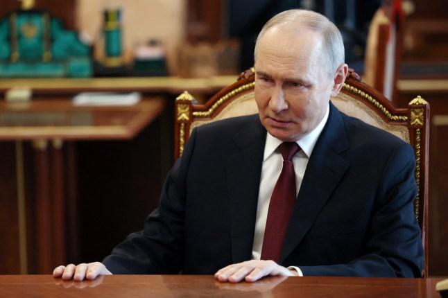 TOPSHOT - In this pool photograph distributed by the Russian state agency Sputnik, President Vladimir Putin meets with Chief of the General Staff of the Russian Armed Forces in Moscow on April 19, 2025. Putin announced an Easter truce in the conflict in Ukraine starting this evening and lasting till midnight on April 20, 2025. (Photo by Vyacheslav PROKOFYEV / POOL / AFP) (Photo by VYACHESLAV PROKOFYEV/POOL/AFP via Getty Images)