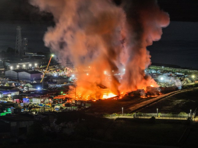 Aerial footage showing a fire tearing across an industrial estate in Erith, southeast London.