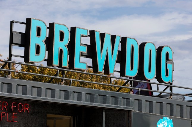 LONDON, UNITED KINGDOM - OCTOBER 13th 2018: A brewdog craft beer sign. BrewDog is a Scottish brewery and pub chain.; Shutterstock ID 1203153919; purchase_order: -; job: -; client: -; other: -