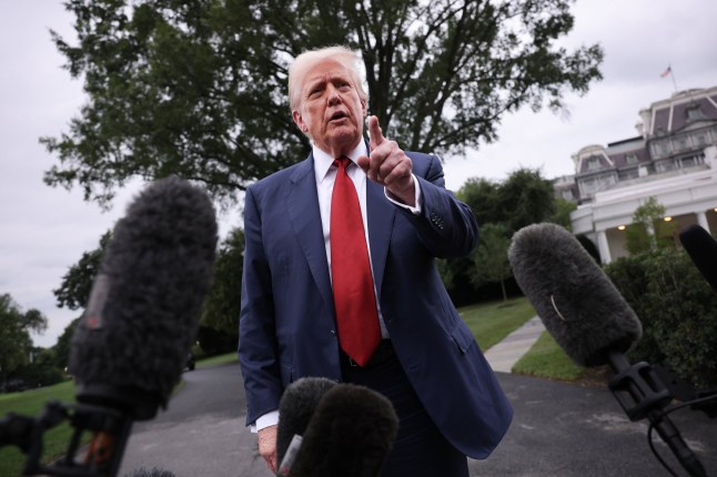 WASHINGTON, DC - AUGUST 01: U.S. President Donald Trump speaks to the media as he departs the White House on August 01, 2025 in Washington, DC. Trump answered a range of questions from reporters before leaving and is scheduled to spend the weekend in Bedminster, New Jersey. (Photo by Win McNamee/Getty Images)