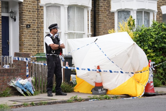 A police officer at the scene at in Monson Road, New Cross, south-east London, where a 26-year-old man was stabbed to death on Saturday. Picture date: Sunday August 3, 2025. PA Photo. Photo credit should read: Lucy North/PA Wire