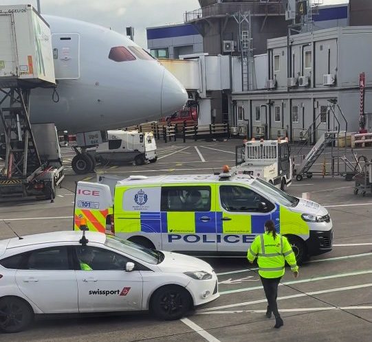 Story from Jam Press (Vaping On Flight) Pictured: A video grab of the 21-year-old lad being escorted off a plane by six cops for allegedly vaping in the toilet. VIDEO: Lad escorted off plane by six cops for ?vaping in toilet? causes two-hour delay A lad caused a two-hour flight delay after he was escorted off a plane by six cops for allegedly vaping in the toilet. The 21-year-old was removed after being accused of committing an aviation offence. Tristan James Walker captured footage of the incident after he claims the toilet smoke alarm was set off. The incident took place at Edinburgh Airport on a Ryanair plane heading to Alicante, Spain. According to Tristan, 39, the flight was set to depart at 09:45am, but was allegedly delayed due to staff sickness. After the alarm sounded, the pilot allegedly informed the 21-year-old he would be removed from the plane. Tristan said that over six officers boarded the aircraft to remove the man, who was taken into a van. Police confirmed the 21-year-old was charged in connection with an aviation offence. The footage was captured on 3 July. ?A young lad in a group happened to set the alarm off for apparently vaping,? Tristan told Luxury Travel Daily. ?The pilot then came out after the air stewardess explained what happened, and then the pilot stated he would be removed from the plane. ?The young lad waited for over six police officers to come on board. ?He was taken off, he was very calm, didn't argue or anything, no drama. ?We then happened to bump into him on Benidorm?s famous strip and he told us he just got a caution and was banned from Ryanair.? A Police Scotland spokesperson said: ?Around 7.55 am on Thursday, 3 July, 2025 were called to an aircraft at Edinburgh Airport. ?Officers attended, and a 21-year-old man was charged in connection with an aviation offence. ?A report was submitted to the Procurator Fiscal.? Jam Press has contacted Ryanair for comment. ENDS EDITOR'S NOTE: We would advise obscuring the face of the 21-year-old man who gets arrested in the video prior to publication. Grabs have been provided with blurring for your reference. Video Usage Licence: (EXCLUSIVE) We have obtained an exclusive licence from the copyright holder. A copy of the licence is available on request. Video Restrictions: None.
