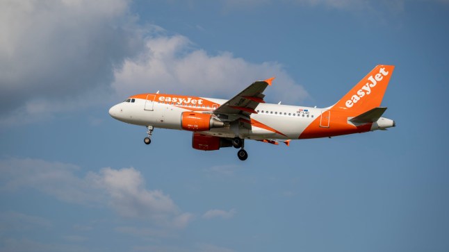 Easyjet Airbus A319 is landing at MXP Milano Malpensa International Airport