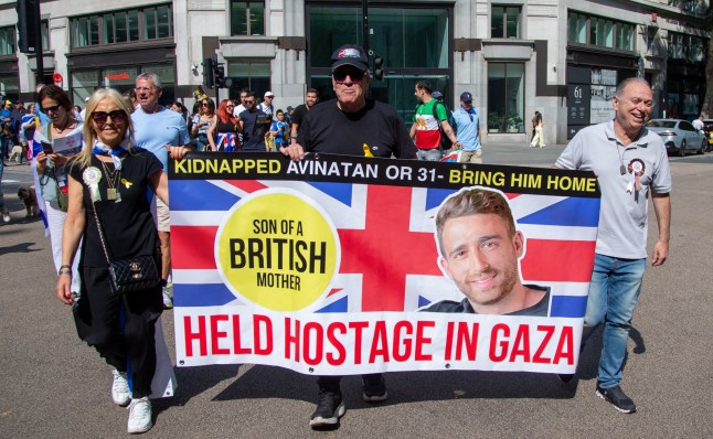 epa12292402 Protesters join family members of the hostages being held by Hamas, at the March for the Hostages in London, Britain, 10 August 2025. The protesters called for the immediate release of the hostages. According to Israel's military (IDF), around 50 Israeli hostages remain in captivity in the Gaza Strip. EPA/TAYFUN SALCI