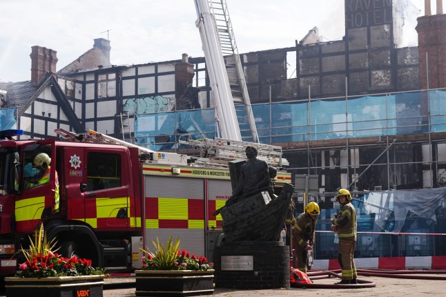 Fire crews continue to work at the scene of the Raven Hotel in Droitwich Spa, Worcestershire, following a fire at the Grade II listed site which began on Sunday. Picture date: Monday August 11, 2025. PA Photo. Photo credit should read: Jacob King/PA Wire