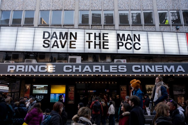 Sign reads 'Damn the man, save the PCC' outside the Prince Charles Cinema just off Leicester Square on 2nd February 2025 in London, United Kingdom. The Prince Charles Cinema is well known for its budget prices and ecclectic programme of films, but faces uncertainty in it's future following a lease dispute with the landlord, although a petition to save the cinema has gained many signatures and it remains a high profile story. (photo by Mike Kemp/In Pictures via Getty Images)