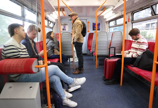 Mandatory Credit: Photo by NEIL HALL/EPA-EFE/Shutterstock (15317681c) Passengers travel on a South Western Railway service at a station in London, Britain, 24 May 2025. The UK Government is to begin to nationalise train services under the Great British Railways brand on 25 May 2025. The South Western Railway franchise will become the first railway franchise to be re-nationalised as part of the Labour election manifesto. UK starts to nationalise rail services under the Great British Railways brand, London, United Kingdom - 24 May 2025