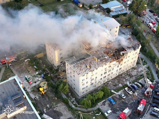 KHARKIV, UKRAINE - AUGUST 18: (----EDITORIAL USE ONLY - MANDATORY CREDIT - 'KHARKIV REGIONAL PROSECUTOR'S OFFICE / HANDOUT' - NO MARKETING NO ADVERTISING CAMPAIGNS - DISTRIBUTED AS A SERVICE TO CLIENTS----) A view of the site as firefighting efforts and search and rescue operation continue after a Russian airstrike in Kharkiv, Ukraine on August 18, 2025. At least 11 people were injured after the airstrike. The overnight attack struck residential areas, according to Ukrainian authorities, who underlined that civilians were among those wounded. (Photo by Kharkiv Regional Prosecutor's Office / Handout/Anadolu via Getty Images)