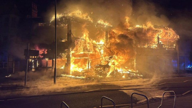 Firefighters are tackling a major blaze at a building in West Avenue this evening (Sunday, 17 August 2025). Emergency services have urged nearby residents to keep all windows and doors shut due to large amounts of smoke drifting across the area. Firefighters battle large blaze in Clacton as residents evacuated Essex County Fire and Rescue Service said crews were called at 12.35am to reports of a building fully alight. Six stations, including Clacton, Dovercourt, Manningtree, Weeley, Colchester, Tiptree and Chelmsford, have been deployed to the scene. Residents living nearby have been evacuated, while others are being advised to keep windows and doors shut due to the large amount of smoke. Incident Commander Nick Singleton said: ???Crews have worked hard to surround the fire. We will be remaining here for a significant time during the day to make sure the fire is fully extinguished. Jackson Road, Penfold Road and Agate Road will be shut and experience disruption while our crews remain at the incident. Thank you to our emergency services colleagues who have helped us safely evacuate nearby residents.??? Police and ambulance teams are also assisting at the scene. The cause of the fire is not yet known, and an investigation will be launched once the site has been made safe. Motorists are urged to avoid West Avenue and surrounding roads until further notice.