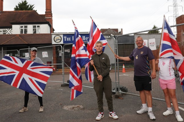 ? Licensed to London News Pictures. 19/08/2025. Epping, UK. Triumphant residents gather outside The Bell Hotel, Epping, Essex. Asylum seekers will be removed from the Bell Hotel in Epping, Essex, after Epping Forest district council was granted a temporary High Court injunction. . Photo credit: Jacqueline Lawrie/LNP