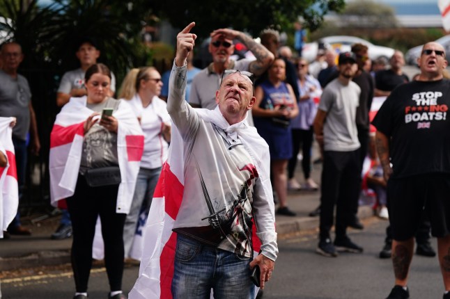 People demonstrating under the Abolish Asylum System slogan outside the Castle Bromwich Holiday Inn in Birmingham. Picture date: Sunday August 24, 2025. PA Photo. Photo credit should read: Jacob King/PA Wire