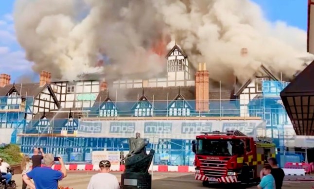 Raven hotel burns to the ground as people film