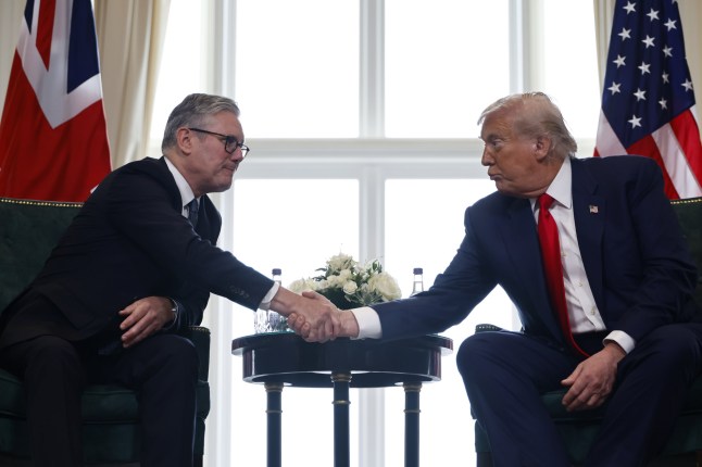 epa12268847 British Prime Minister Keir Starmer (L) and US President Donald J. Trump shake hands during their meeting at the Trump Turnberry golf resort in Turnberry, Scotland, Britain, 28 July 2025. President Trump is on a private trip to Scotland to visit his golf courses. EPA/TOLGA AKMEN / POOL