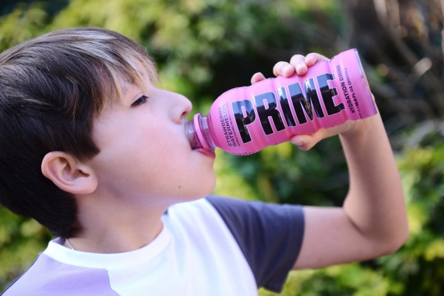KINGSTON UPON THAMES, ENGLAND - FEBRUARY 5: A photo illustration of the photographers son drinking a Prime energy fruit drink on February 5,2023 in Kingston Upon Thames, England. (Photo by Peter Dazeley/Getty Images)