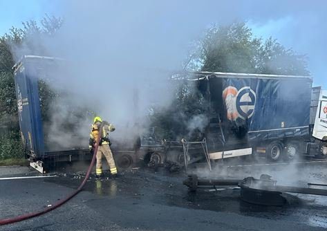 Work to extinguish the fire continues at scene.