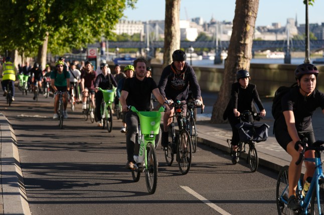Cyclists on Embankment in London yesterday.