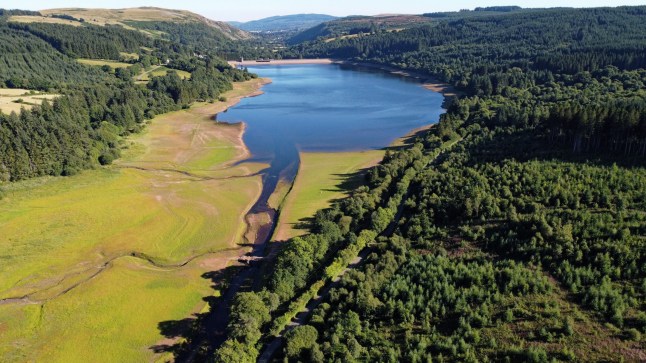 Mandatory Credit: Photo by Dimitris Legakis/Athena Pictures/Shutterstock (13087061ab) Receding water level at Llwyn On Reservoir on the A470 near Merthyr Tydfil Seasonal weather, Wales, UK - 11 Aug 2022