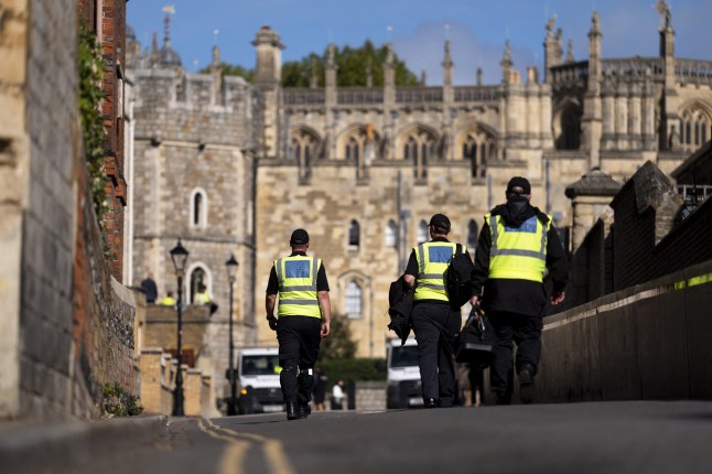 A Thames Valley Police officers from the Police force's Specialist Search Unit, carry out security searches outside of Windsor Castle in Windsor, on September 12, 2025, ahead of the State Visit by US President Donald Trump next week. US President Donald Trump's unprecedented second UK state visit next week will involve a state banquet hosted by King Charles III and a bilateral with Prime Minister Keir Starmer, Buckingham Palace said this week. (Photo by Jordan Pettitt / POOL / AFP) (Photo by JORDAN PETTITT/POOL/AFP via Getty Images)