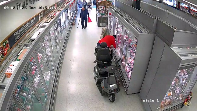 Malcolm Ravenhill, stealing steaks from a Co-op in Orton Goldhay, Peterborough. Watch the bizarre moment a scooter-riding pensioner steals more than ?250 worth of steaks from a Co-op days after he was given second chance to run his life around. Prolific shoplifter Malcolm Ravenhill, 63, can be seen parking up next to a meat fridge on aisle one and stuffing steaks into the rear of his silver and black electric scooter and leaving the shop. Ravenhill - wearing an orange jumper - seemed undeterred by other customers when he committed the heist at a Co-op in Orton Goldhay, Peterborough, on a mobility scooter on 2 September at about 10.50am. It came just six days after the pensioner was handed a suspended sentence - intended to warn offenders and give them a second chance to stay out of trouble - at Peterborough Magistrates? Court for a similar offence. Photo released 16/09/2025