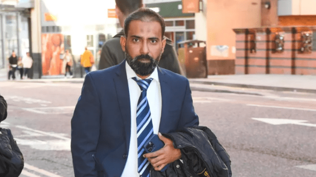 Dr Suhail Anjum in a suit and tie